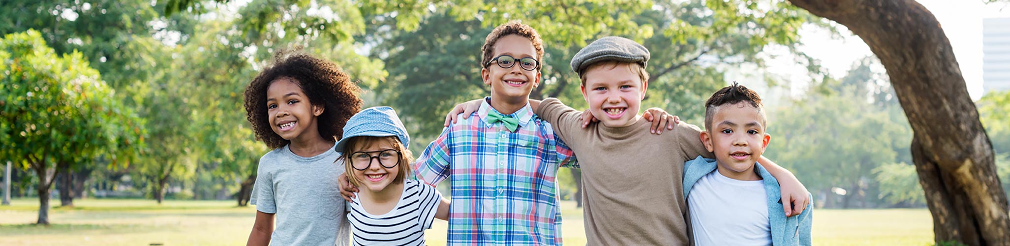 Group of young children standing in a row