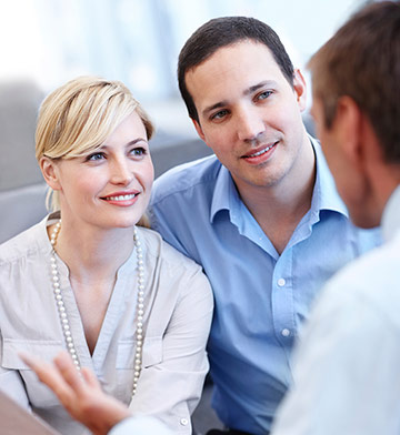 man and woman talking with another man