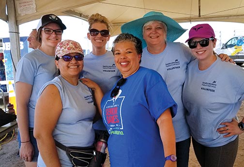 Sunward Employees pose for a photo while volunteering at the 2019 National Senior Games