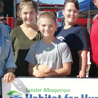 The future homeowners of the new Habitat home